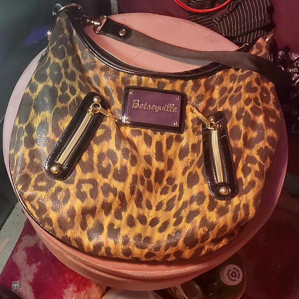 Betseyville leopard print hand bag